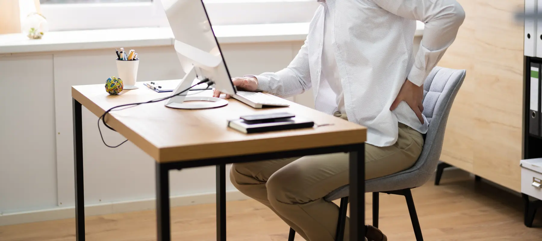 Simple PT Tips To Stop Slouching And Reduce Back Pain At Your Desk